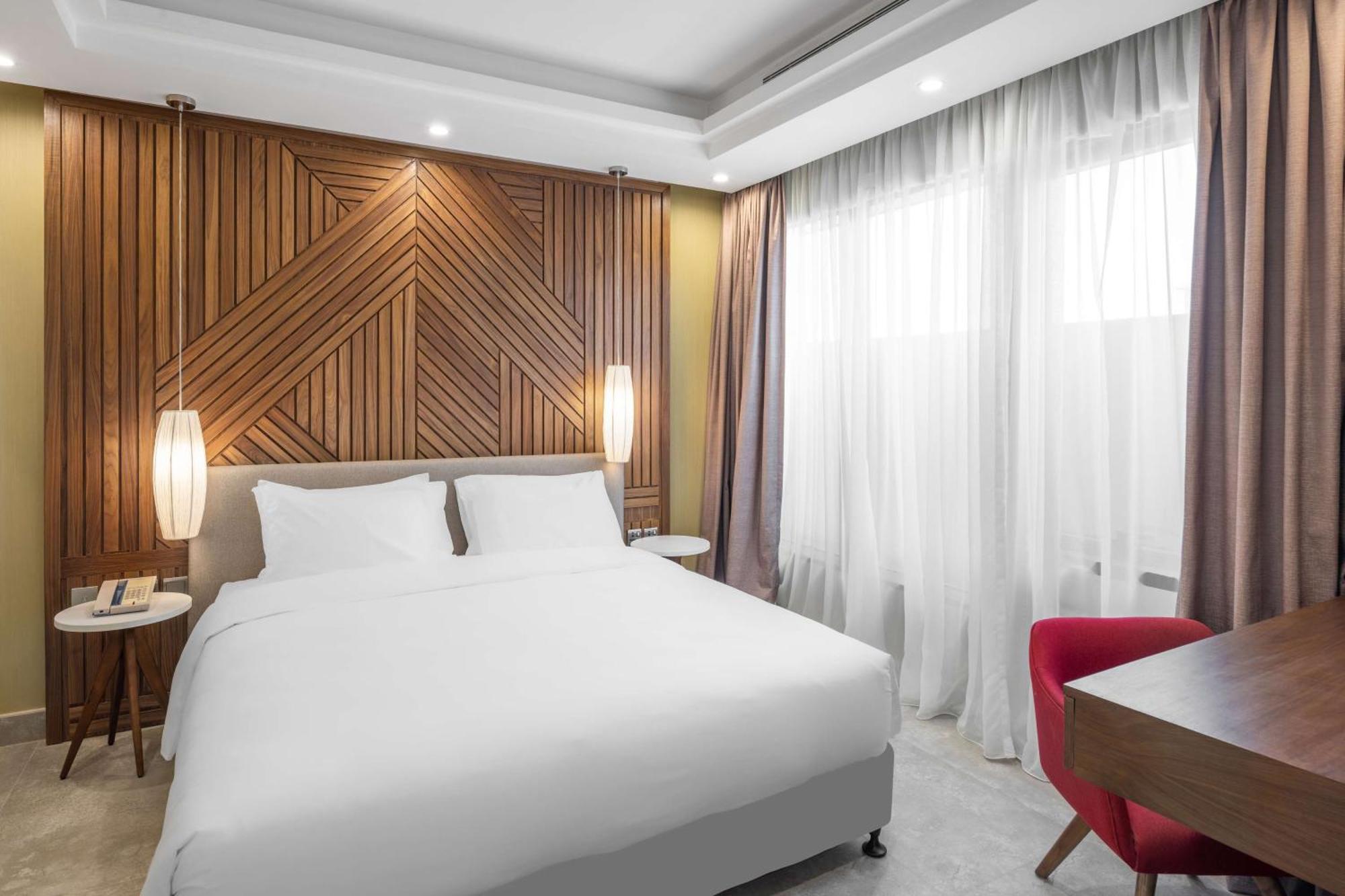 Radisson Blu Hotel Riyadh Qurtuba Buitenkant foto Deluxe Room